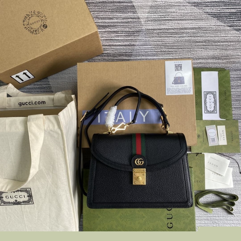G*u*i top handle bags